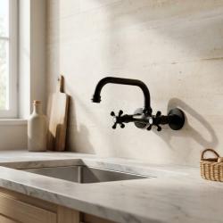 black-kitchen-faucet-with-cross-handles-wall-mounted